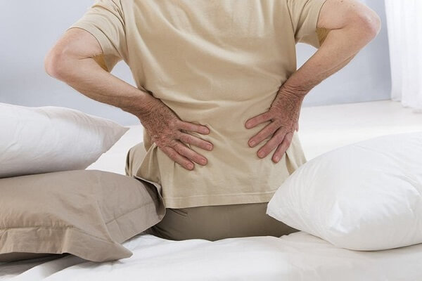 Đau cột sống lưng khi ngủ dậy là bệnh gì và cách điều trị